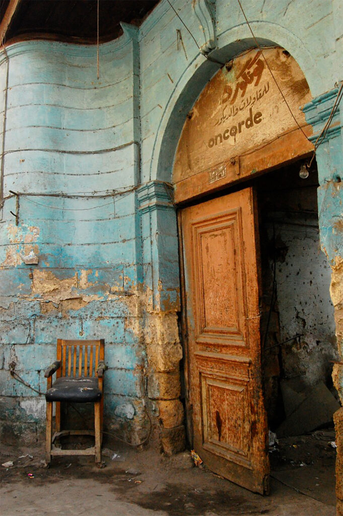 rustic wood door and turquoise painted wall